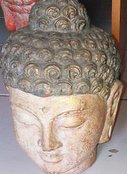 Buddha head in cement. Size H22 cm. Price Exwork 54.000 IDR. Price FOB 4,10 usd excl packing. Art. code: CP099.